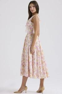 Detail of pink floral summer dress showing the drawstring waist and lightweight fabric