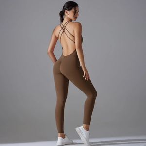 Detail of cross-back straps and scrunch butt design on brown yoga bodysuit