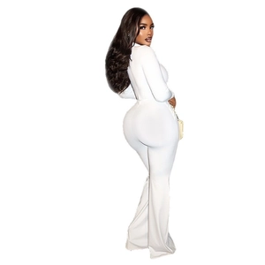 Slim fit white long sleeve jumpsuit with flared trousers seen from a side back view