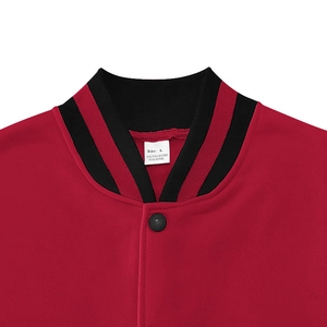 Detail of red baseball jacket collar with black striped ribs and metallic snap buttons