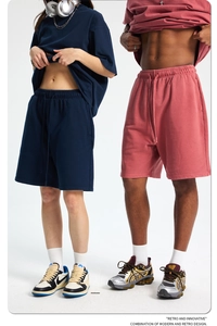 Detail of vintage navy and red oversized heavy cotton shorts showing texture and fit