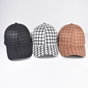 Houndstooth baseball caps in black, white, and brown colors with a retro textured wool look