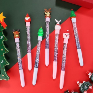 Penne di Natale con glitter e figure di Babbo Natale in design rosso e verde vivace