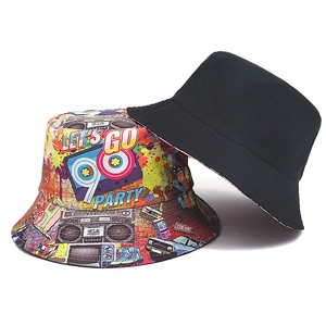 Reversible bucket hat with 90s vintage cassette print and solid black cotton canvas