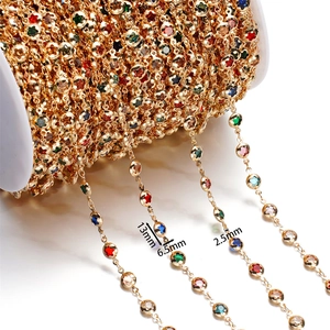 Detail of colorful star cubic zirconia gold-plated chain with size labels and dimensions