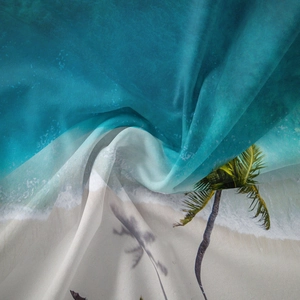 Macro detail of high-quality digital print on soft bohemian tropical island tapestry fabric