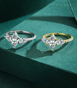 Close-up of S925 sterling silver rings with marquise-cut zircon in gold and silver finish