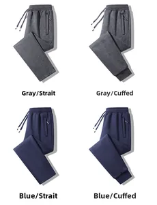 Detail view of men's jogger and straight pants with drawstring waist and zip pockets