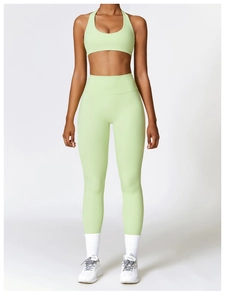 Detail of high waist yoga set in mint green with elastic moisture-wicking fabric