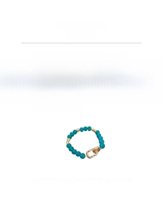Detail view of turquoise stone bracelet with copper rings weighing 17.3g and 19cm length