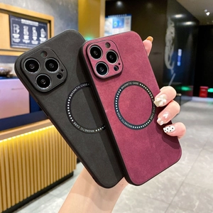 Detail of black and burgundy frosted magnetic cases for iPhone 14 with charging ring