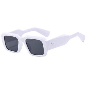 Retro square frame sunglasses in white with dark grey lenses and side metal stud details