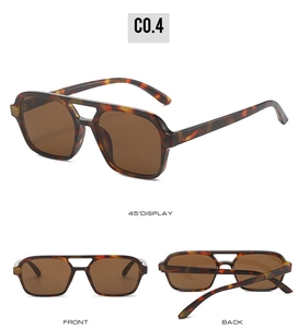 Detail view of square tortoiseshell frame sunglasses with double bridge and brown lenses