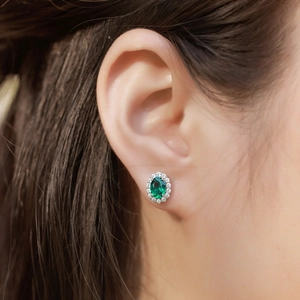 S925 silver halo stud earrings with oval emerald and sparkling micro-inlaid stones