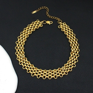 Detailed view of layered gold chunky chain necklace with lobster clasp and extender