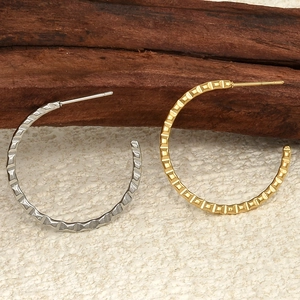 Exaggerated 304 stainless steel hoop earrings with textured geometric design in gold and silver