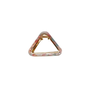 Triangular acetate hair claw clip with colorful marble pattern and gold metal frame