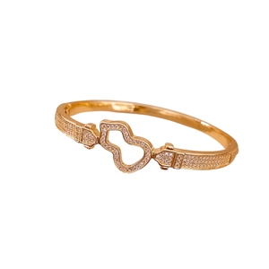 Luxurious 18K gold plated hollow wulu bangle with sparkling pavé setting crystals