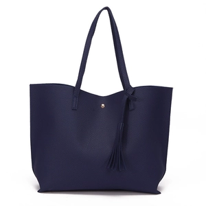 Deep blue litchi pattern tote bag with gold buckle and stylish long tassel detail