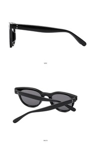Side and back view of black retro sunglasses featuring classic double rivet decorations