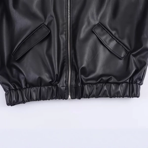 Fashionable black faux leather jacket with metal zipper and elastic hem details