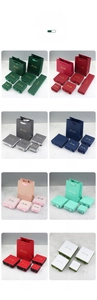 Selection of jewelry gift boxes in eight colors with bags and gold Jewelry logo