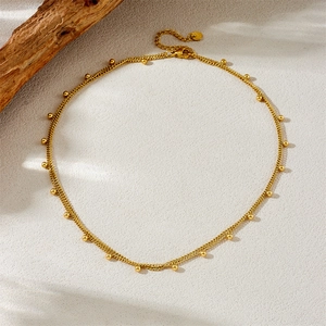 Collier double couche minimaliste en acier inoxydable doré avec billes pour femme