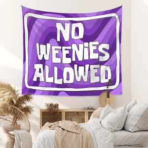 Detail of purple wavy tapestry with No Weenies Allowed text in cozy bedroom setting