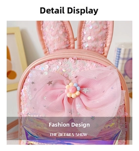Close-up of pink sequin kids backpack with mesh bow and 3D long rabbit ear details
