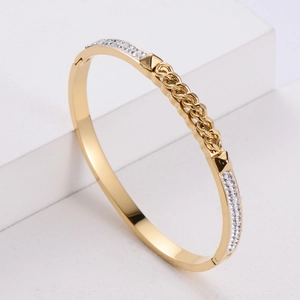 Elegant gold titanium steel hinged bracelet with micro-pave crystals and chain motif