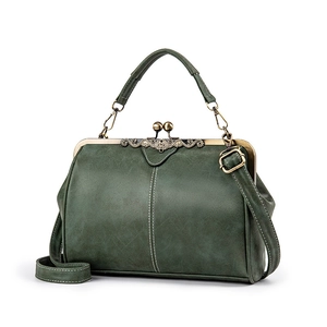 Vintage dark green frosted leather doctor bag with gold metal clasp and top handle