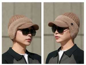 Detail of tan winter knit hat with ear flaps and fleece trim for elderly men