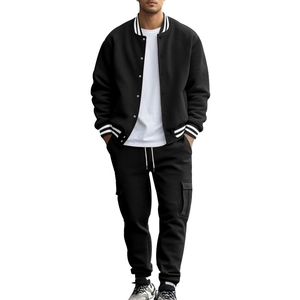 Front view of men's black varsity jacket and matching jogger pants in premium knit fabric