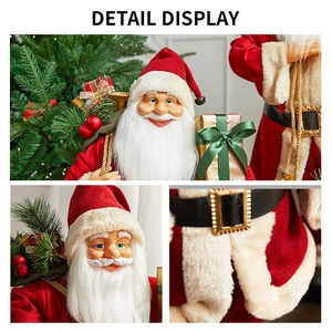 Classic Santa Claus figurine in red velvet suit with gold belt and holiday gift bag