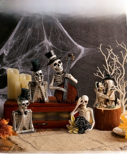 Detailed Halloween skull figurines set with musicians and couples in spooky scene