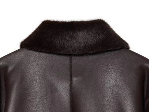 Close-up of deep brown faux leather jacket collar with soft matching fur texture