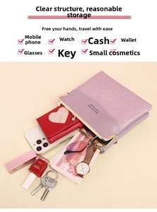 Internal view of light purple crocodile pattern phone bag showing large capacity and items