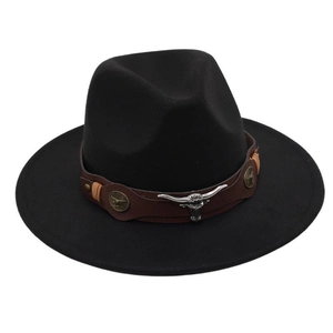 Detail of western fedora hat with brown leather band and silver bull head metal buckle