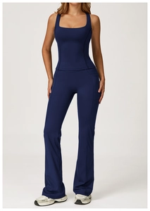 Detail of navy blue yoga set featuring a square neck tank top and flared high-waisted pants