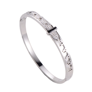 Silver hollow titanium steel bangle with Roman numeral engravings and cubic zirconia stones