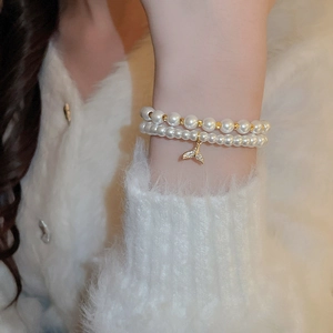 Double-layer pearl bracelet with a sparkling zircon fishtail pendant for women