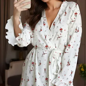 Women's long-sleeved white bathrobe featuring cute rabbit prints and ruffled cuffs