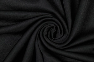 Macro detail of high-elastic black knit fabric texture on sleeveless A-line dress