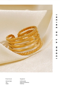 Macro shot of 5-layer 18K gold-plated stainless steel ring with granulation details