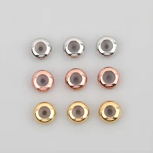 9-piece set of 14K gold plated silicone positioning beads in silver, gold, and rose gold