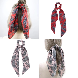 Paisley pattern hair scrunchies with long streamers in red and pink floral designs