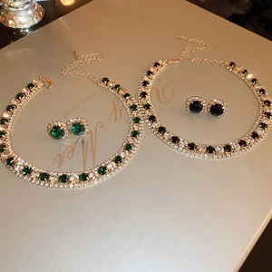 2-piece vintage jewelry set with crystal-encrusted round studs and matching necklace