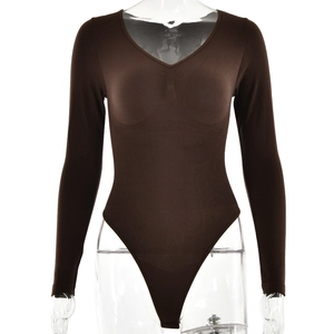 Close-up of the V-neck detail and elastic fabric texture of this brown long sleeve bodysuit