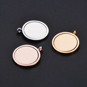 Polished rotating round pendant charms in silver, gold, and rose gold finishes