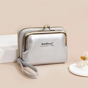 Silver lychee texture coin purse featuring a metal kiss-lock closure and wrist strap